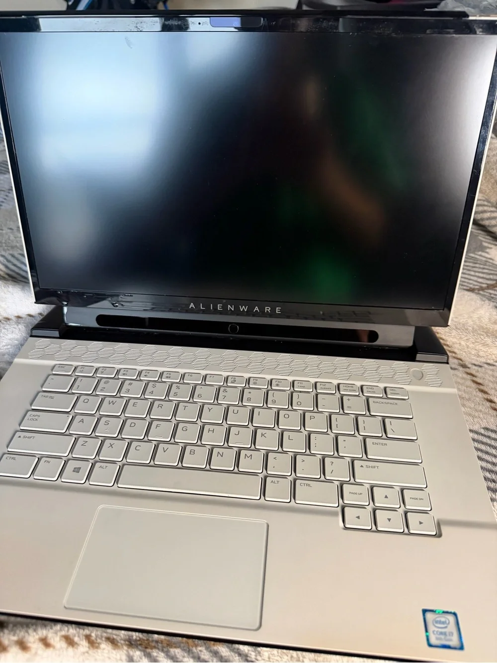 Alienware Silver-Gray Gaming Laptop with Subtle Logo